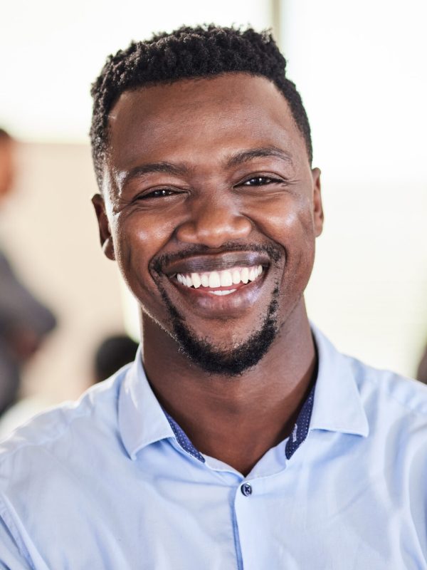 This has been a great business year. Shot of a young businessman in his office